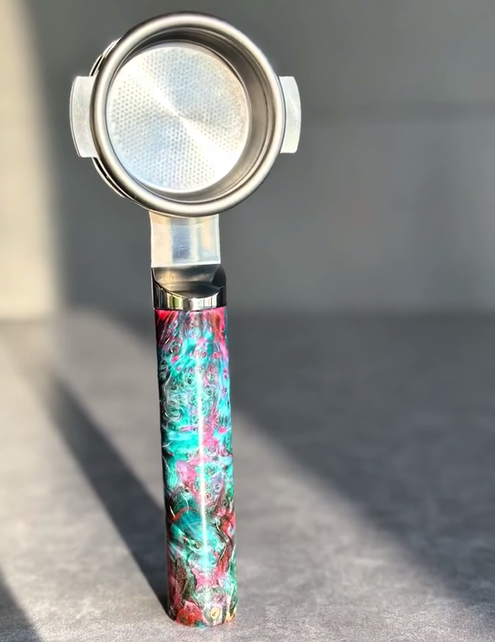 Electric Teal Burl Artisan Bottomless Portafilter paired with La Marzocco espresso machine setup