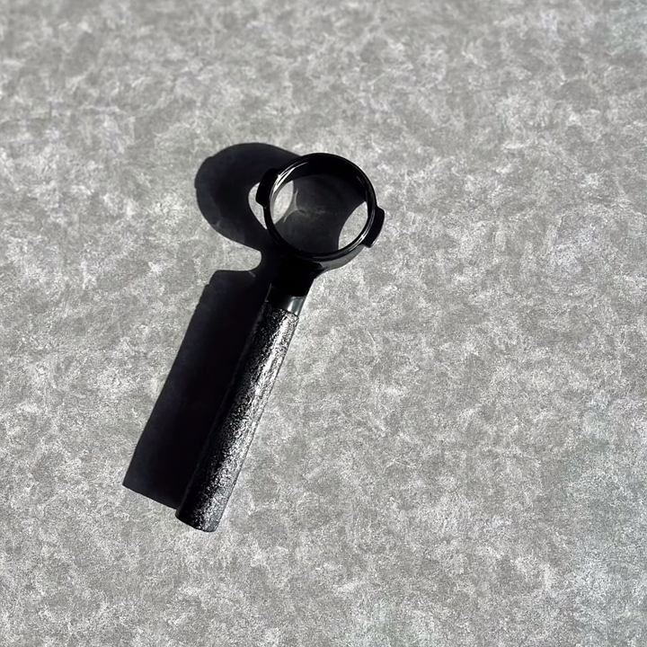 Obsidian Frost Artisan Bottomless Portafilter wood, resin, or metal material detail close-up