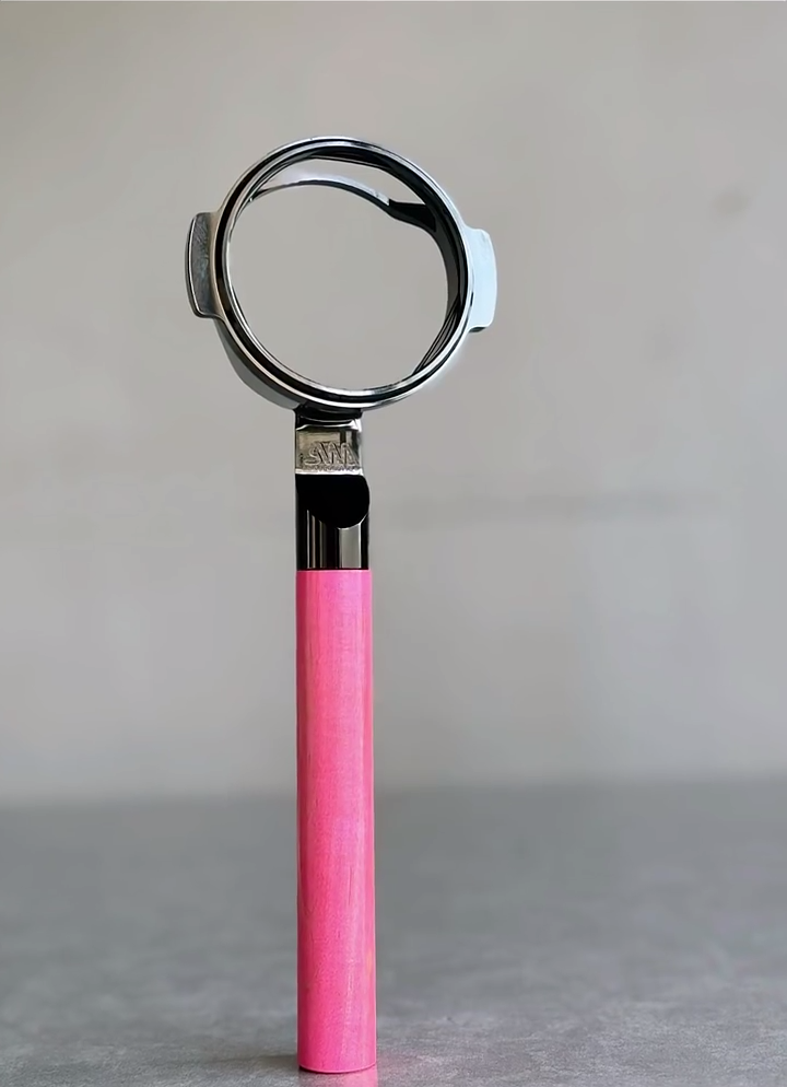 Vivid Pink Artisan Bottomless Portafilter wood, resin, or metal material detail close-up